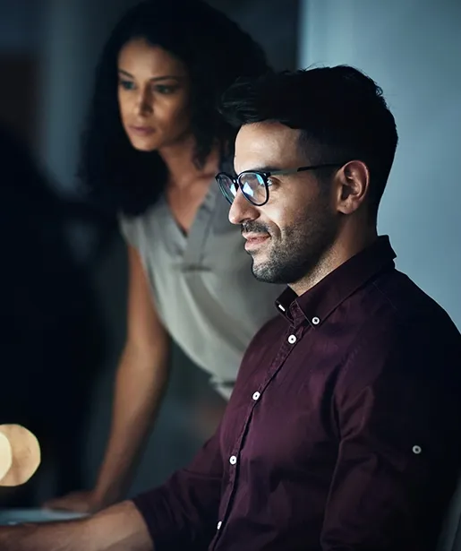 Two recruiters reviewing their document processing workflow